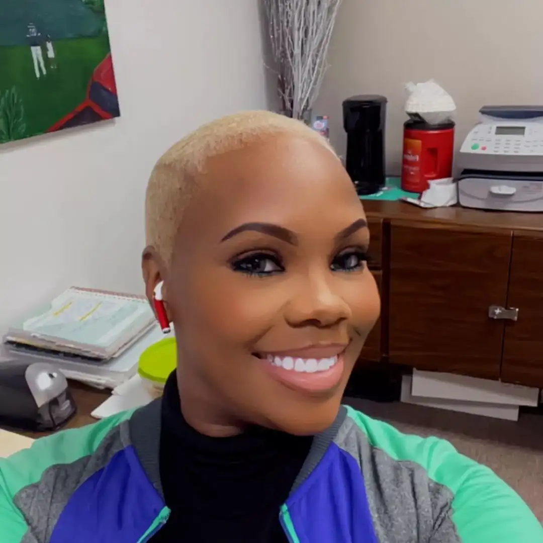 Black Woman with Bold Buzz Cut Hairstyle