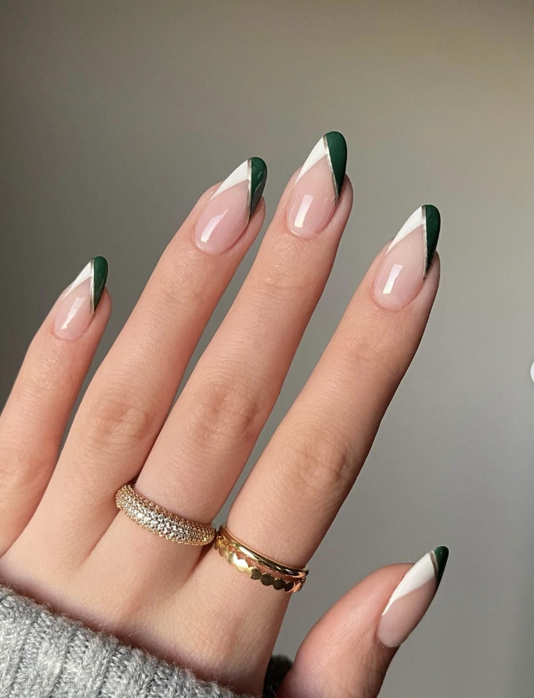 Angled Dark Green and White French Tip Nails with Silver Accent