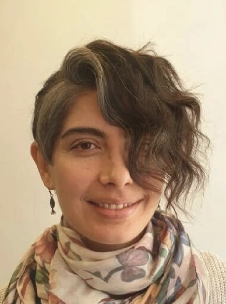 Asymmetrical Brown Pixie Cut with Bangs and Gray Undercut