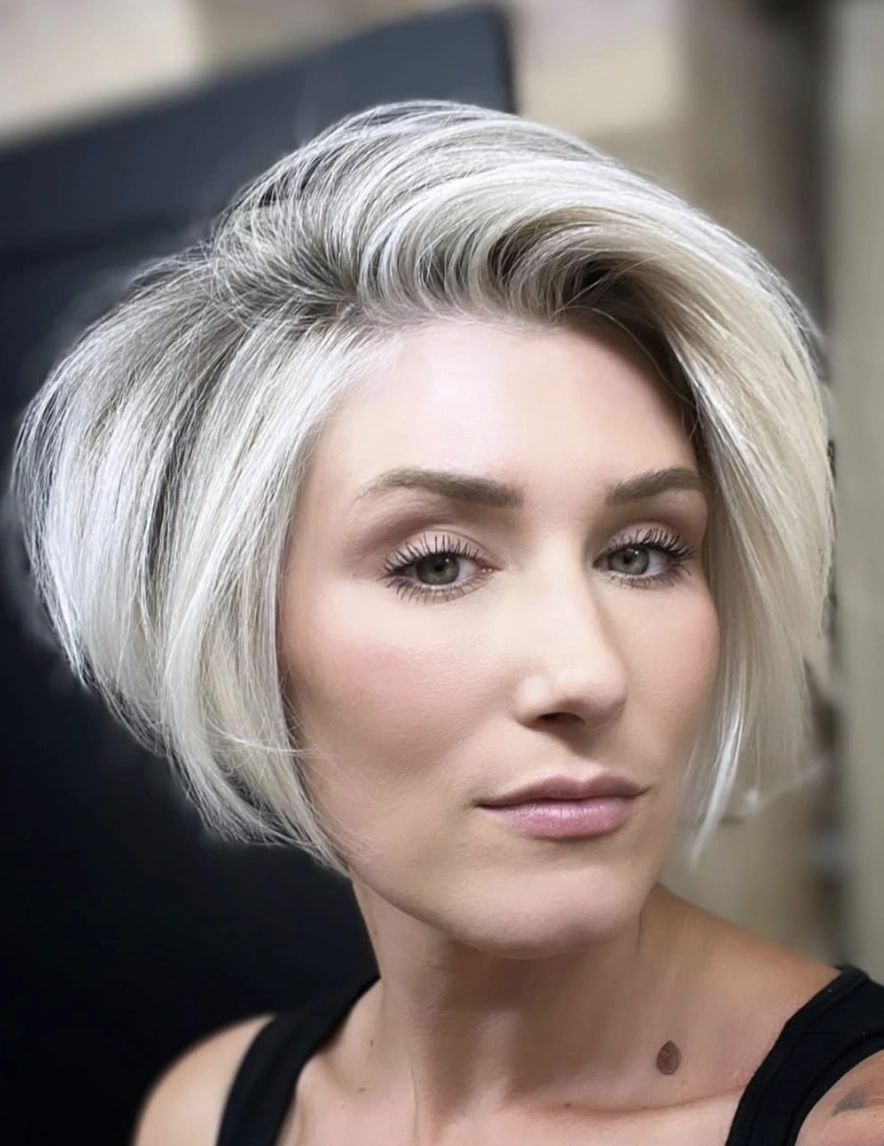 Asymmetrical Platinum Blonde Long Pixie Cut with Root Shadow
