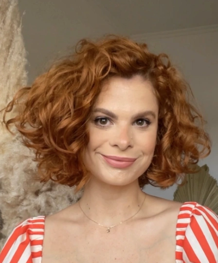 Auburn Curly Bob with Subtle Layers