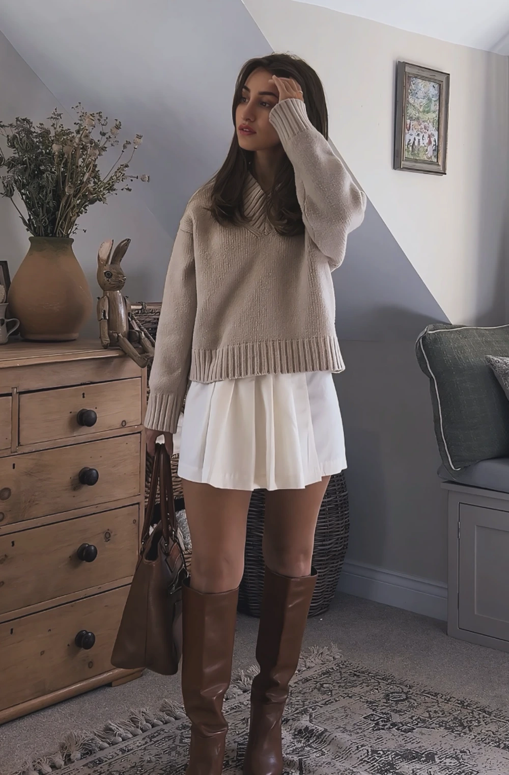 Beige Knit Sweater + White Pleated Skirt + Brown Knee-High Boots