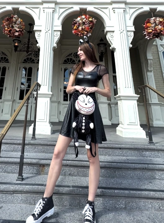 Black Faux Leather Dress + Spooky Plush Backpack + High-Top Sneakers + Cat Ears Headband