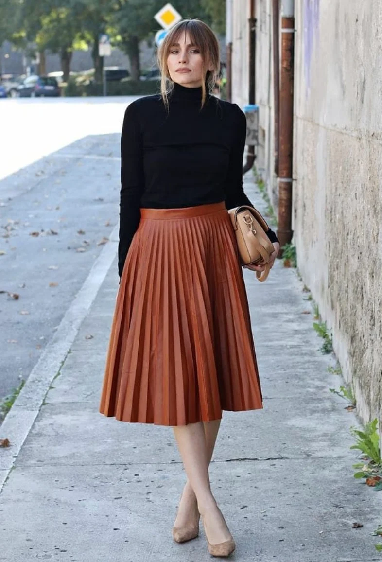 Black Turtleneck Top + Rust Pleated Midi Skirt + Beige Pointed-Toe Heels