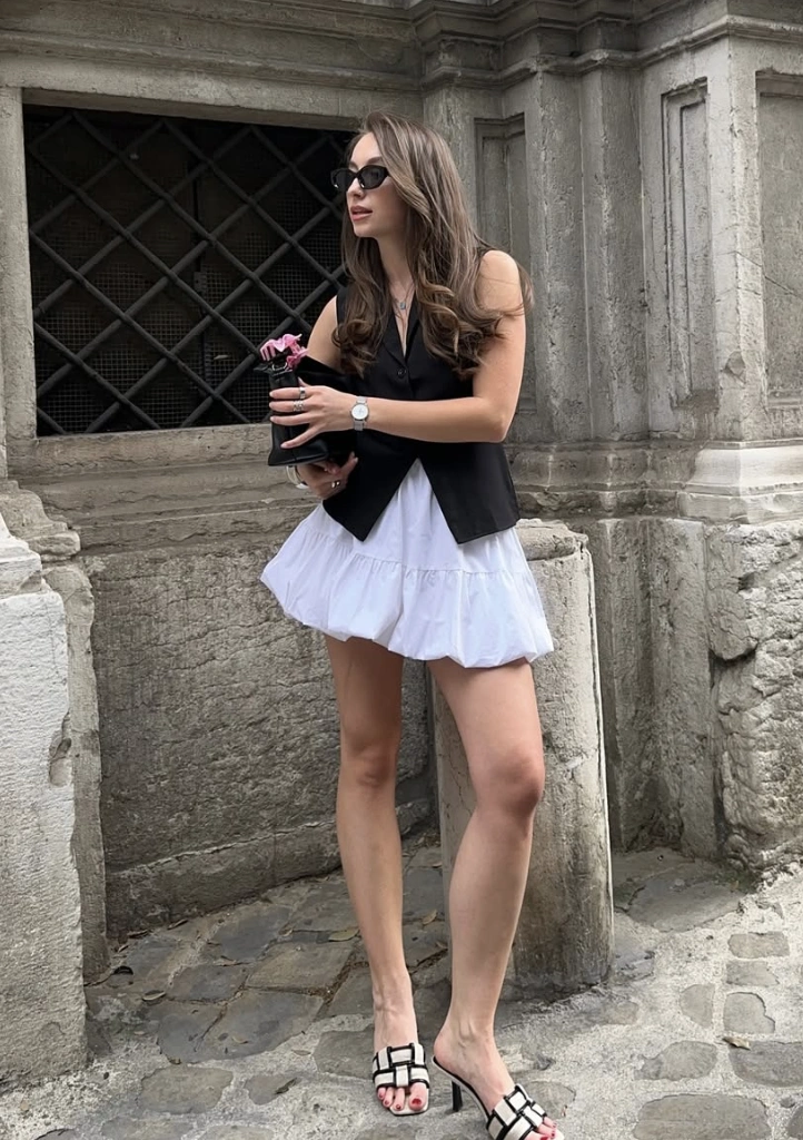 Black Vest + White Tiered Mini Dress + Woven Mules