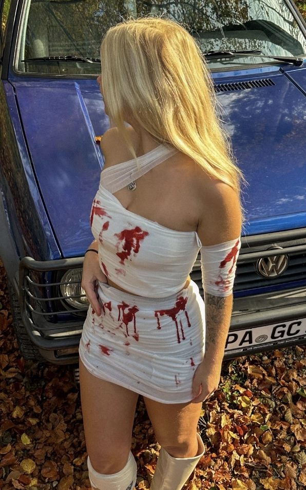 Bloody Bandage Dress + White Knee-High Boots + Spooky Accessories
