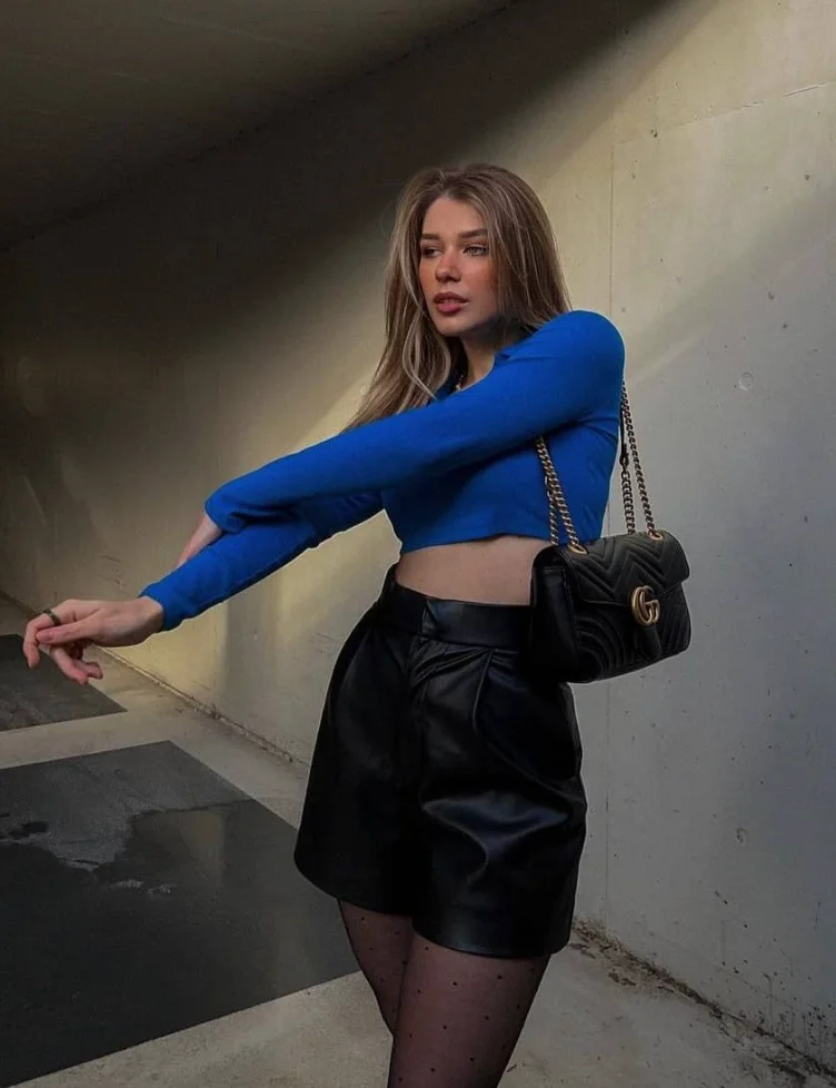 Blue Cropped Sweater + Black Leather Shorts + Black Sheer Polka Dot Tights