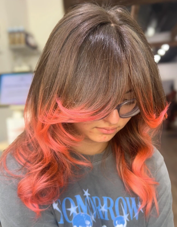 Brown to Coral Ombre with Face-Framing Layers