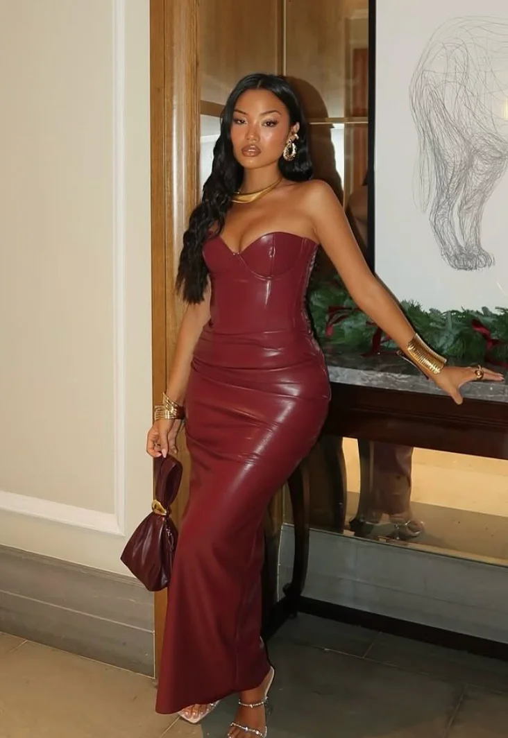 Burgundy Strapless Leather Gown + Gold Statement Earrings + Gold Bracelet + Metallic Heeled Sandals