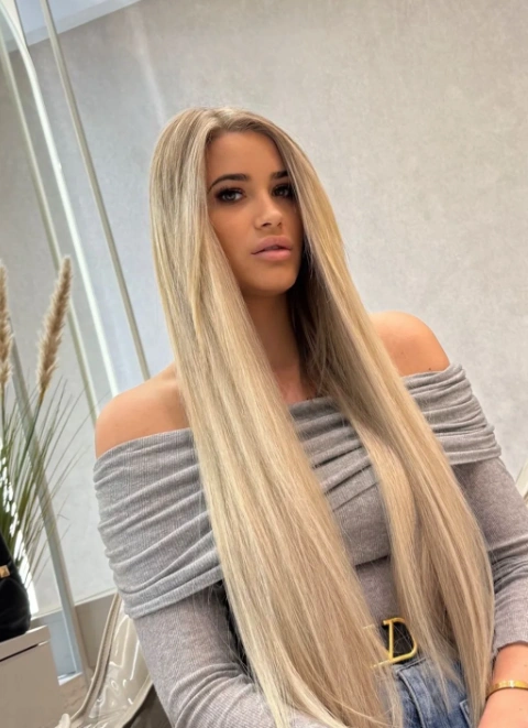 Buttery Blonde: Long Layers for a Flattering Thick Haircut