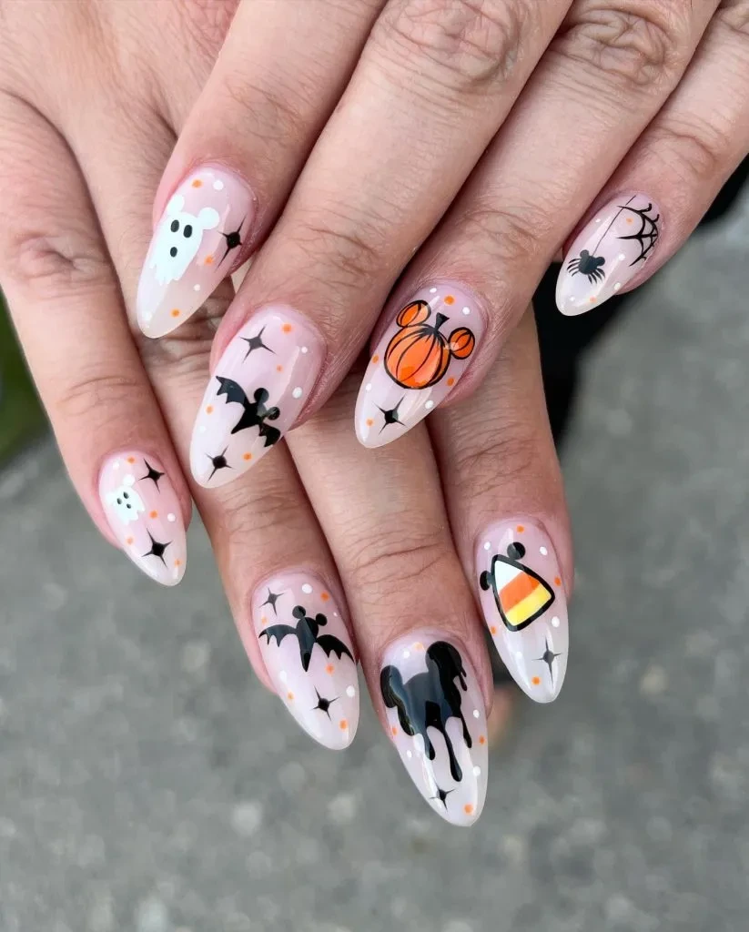 1- Cartoon Ghosts and Candy Corn Almond Nails