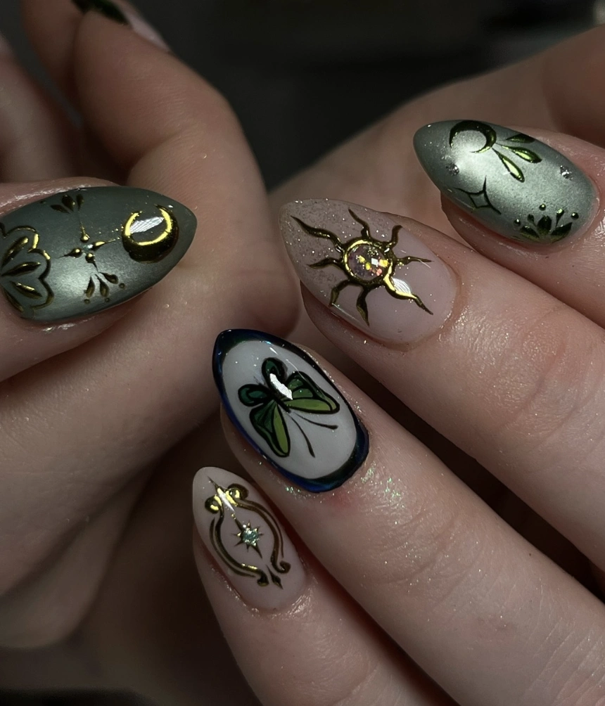 Celestial Charm: Mixed Finish Nail Art with Gold Details