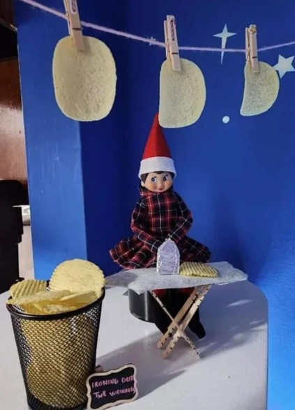 Charming Red and Black Plaid Elf on the Shelf with Ironing Board Setup for Holiday Mischief