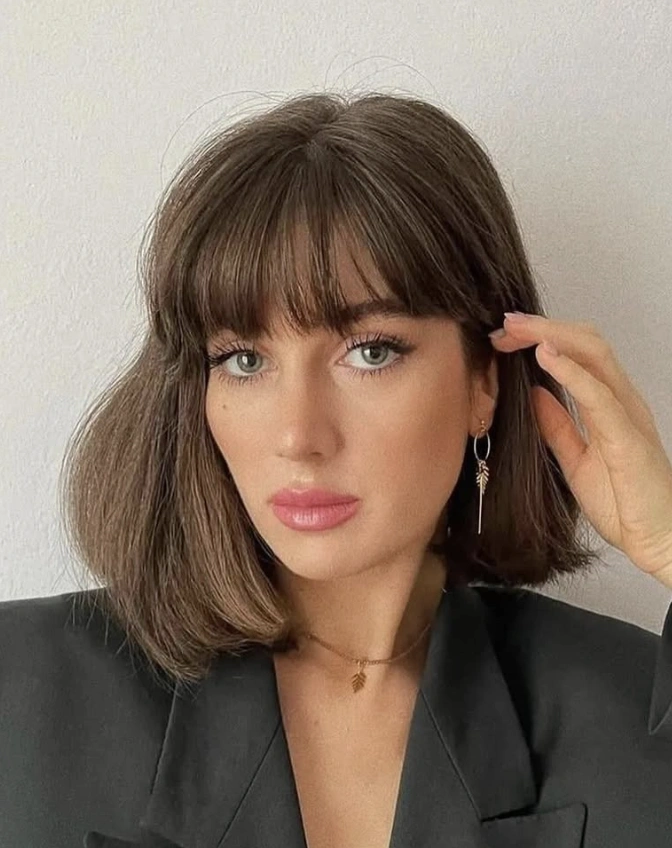 Chic, Low-Maintenance Bob Haircut with Wispy Bangs
