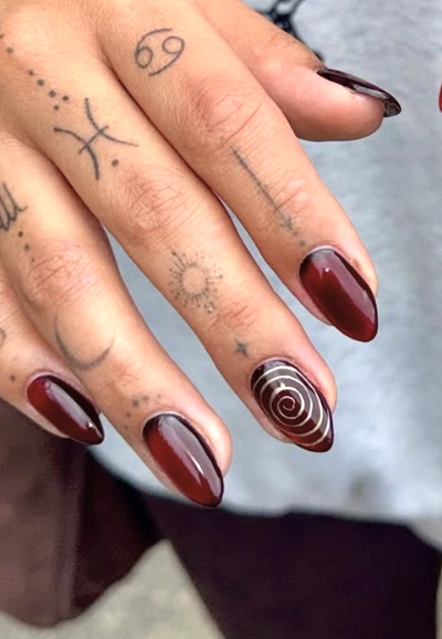 Dark Cherry Almond Nails with Spiral Accent
