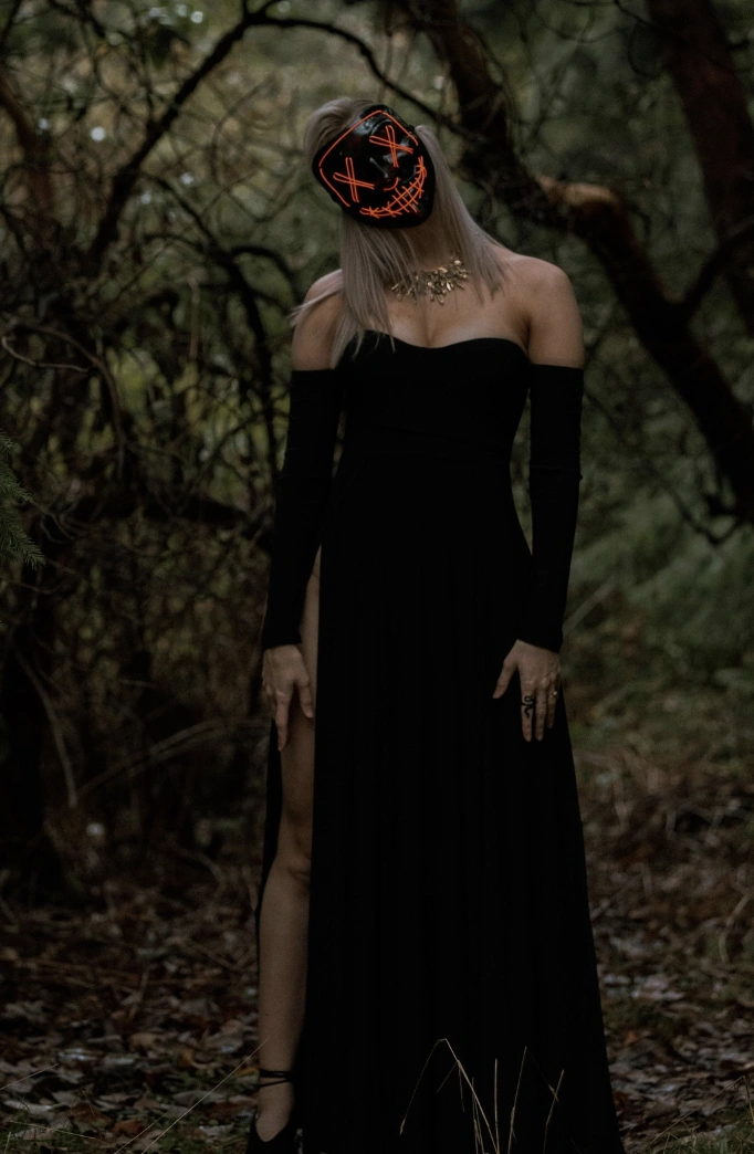 Elegant Black Strapless Dress + Neon Skull Mask + Statement Jewelry + Long Gloves
