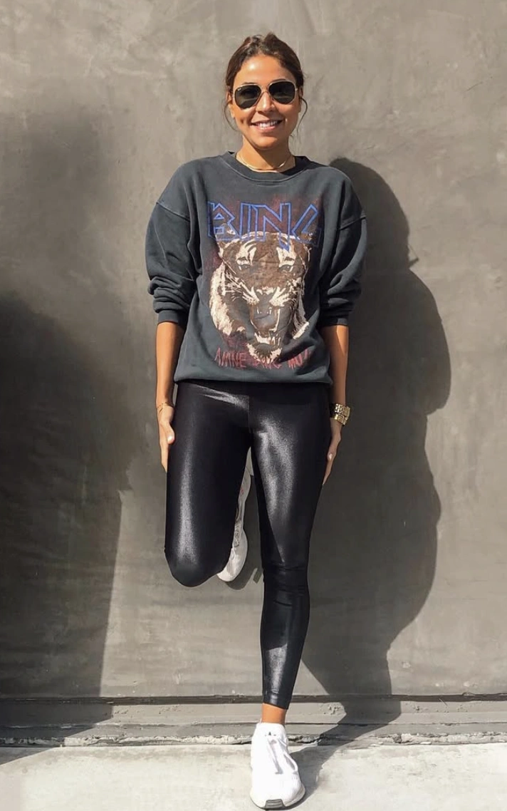 Graphic Sweatshirt + Shiny Leggings + White Sneakers