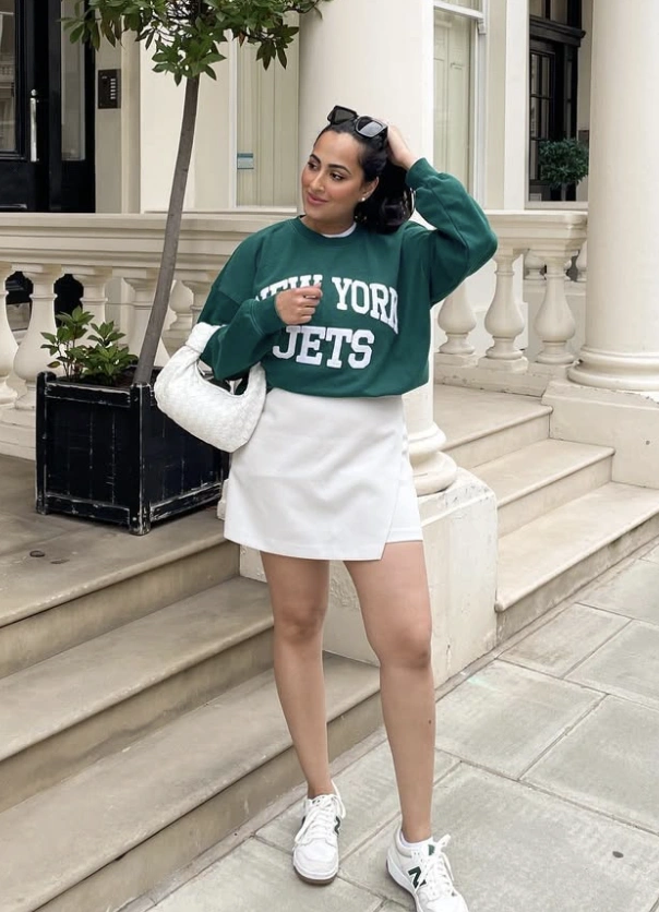 Green Graphic Sweatshirt + White Mini Skirt + White Sneakers
