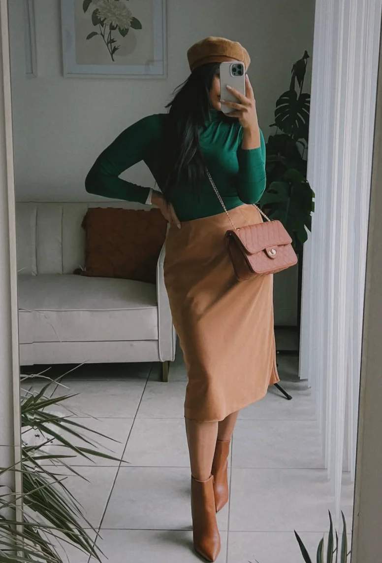 Green Turtleneck Top + Tan Midi Skirt + Tan Leather Knee-High Boots + Tan Beret
