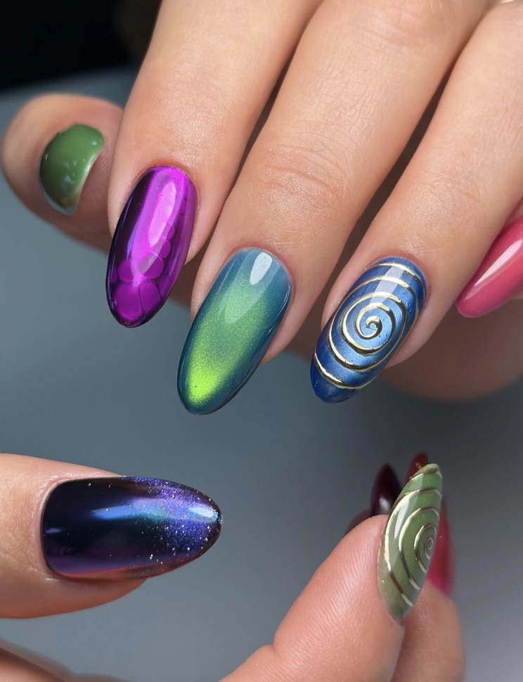 Jewel-Toned Almond Nails with Metallic and Graphic Accents