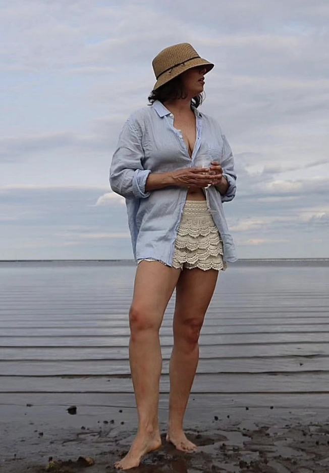 Lace Ruffle Shorts + Light Blue Button-Up Shirt + Beige Sun Hat