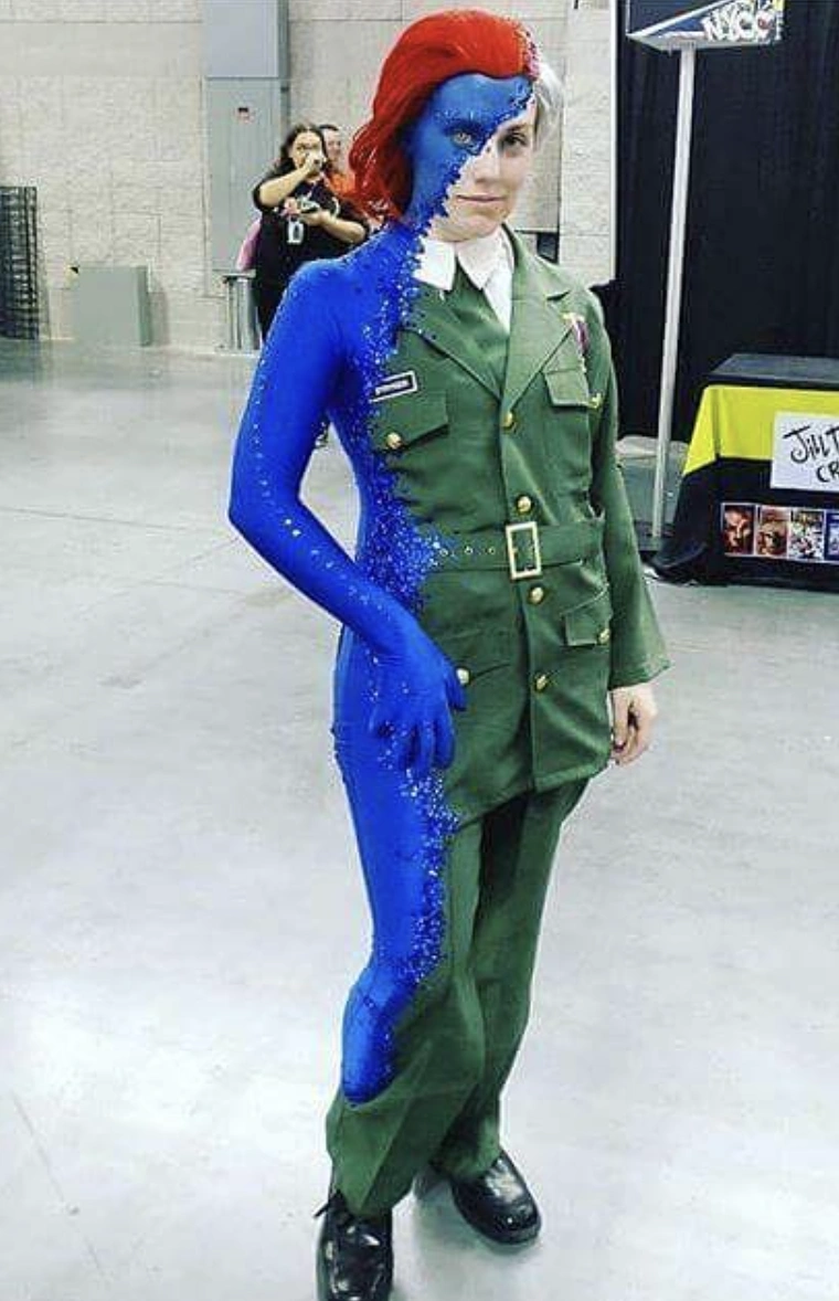 Military Jacket + Blue Body Paint + Red Wig + Black Boots