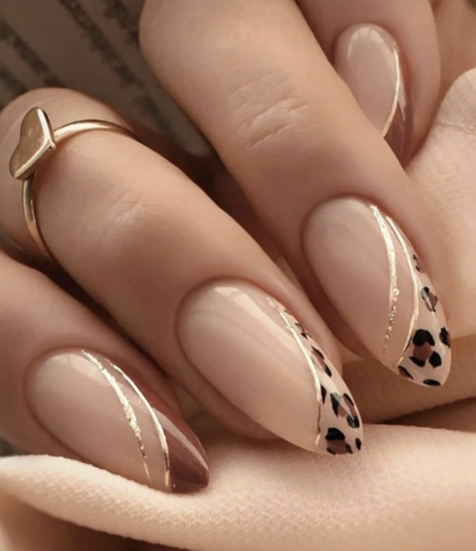 Nude Almond Nails with Brown Accents and Gold Details