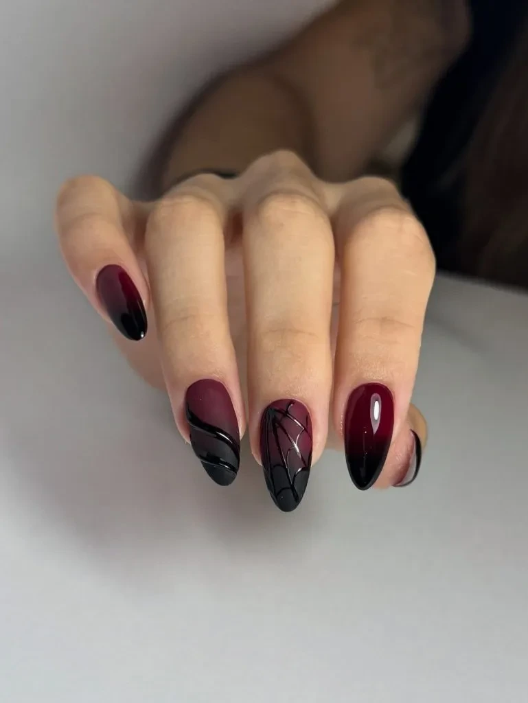 5- Nude Almond Nails with Burgundy Blood Drips