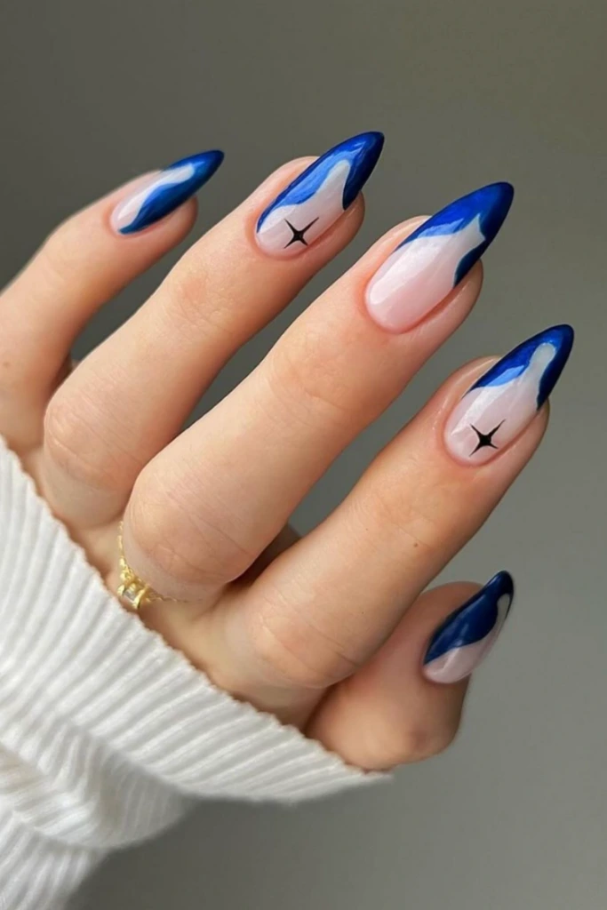 11- Nude Nails With Swirly Blue Tips