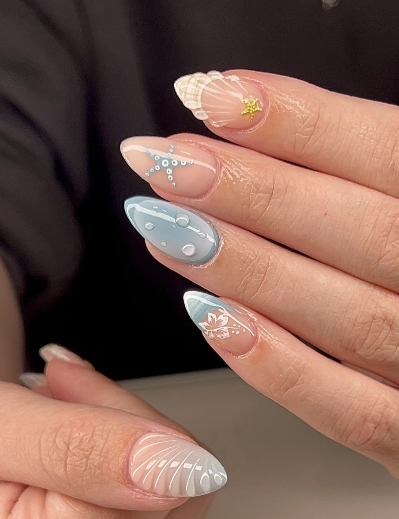 Ocean-Themed Almond Nails with 3D Shell and Starfish Accents