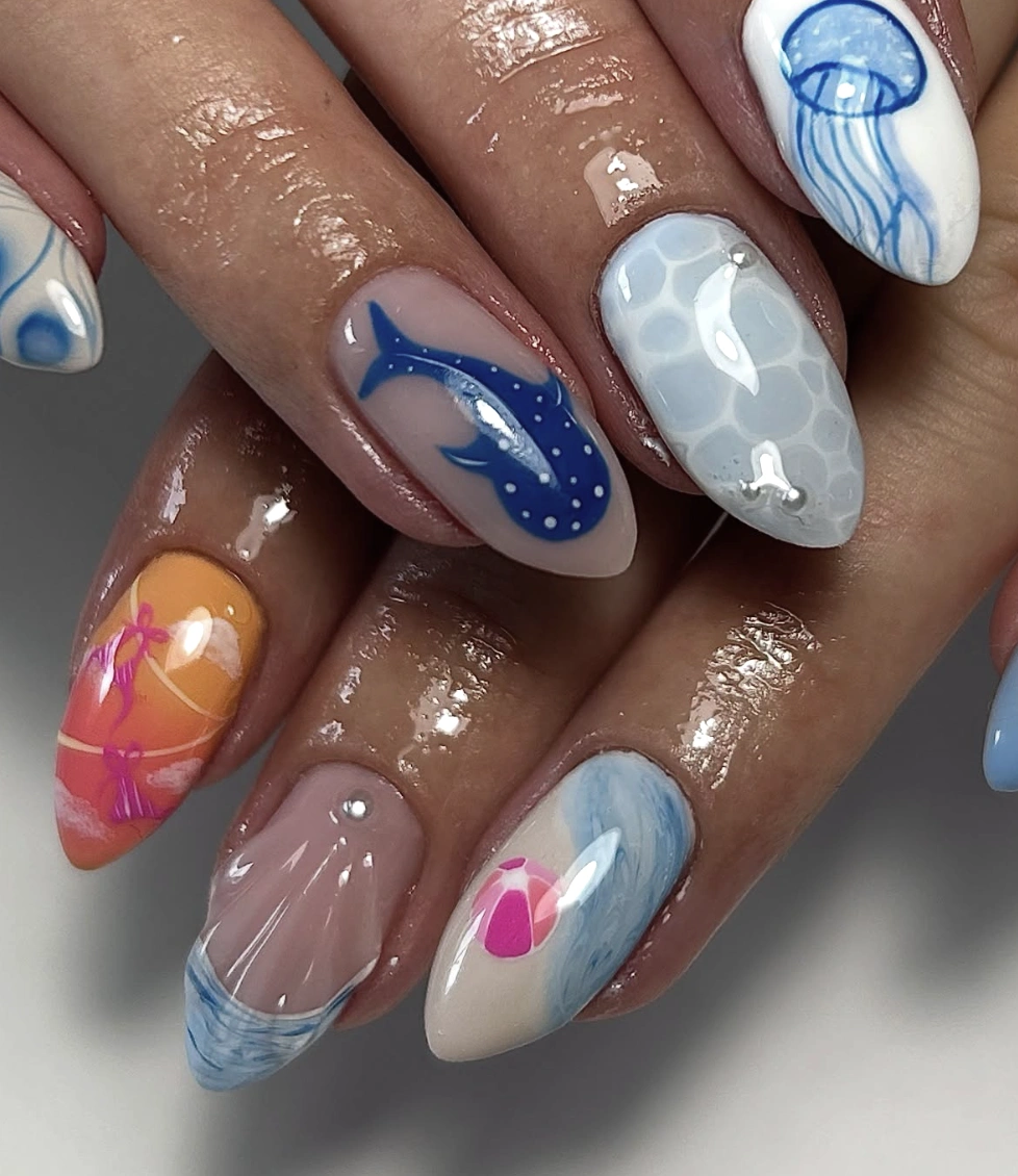Ocean Vibes Almond Nails with Jellyfish, Whale, and Beach Ball Designs