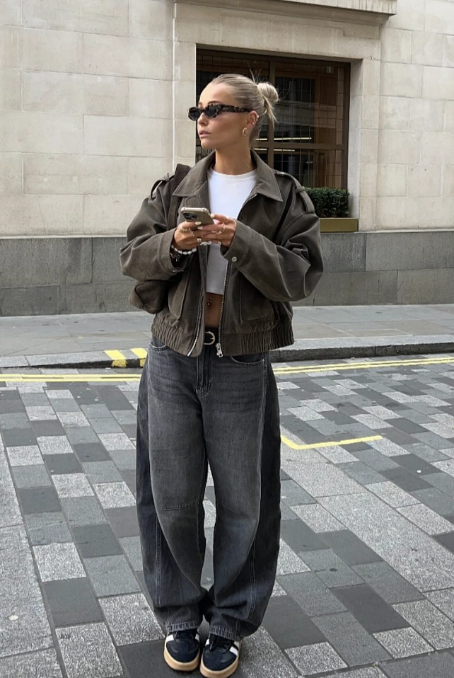 Olive Bomber Jacket + White Crop Top + Grey Barrel Jeans + Navy Sneakers