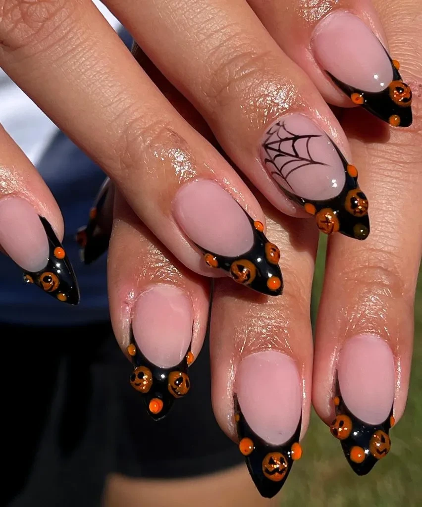 12- Orange Spiderweb Almond Nails with Black Tips