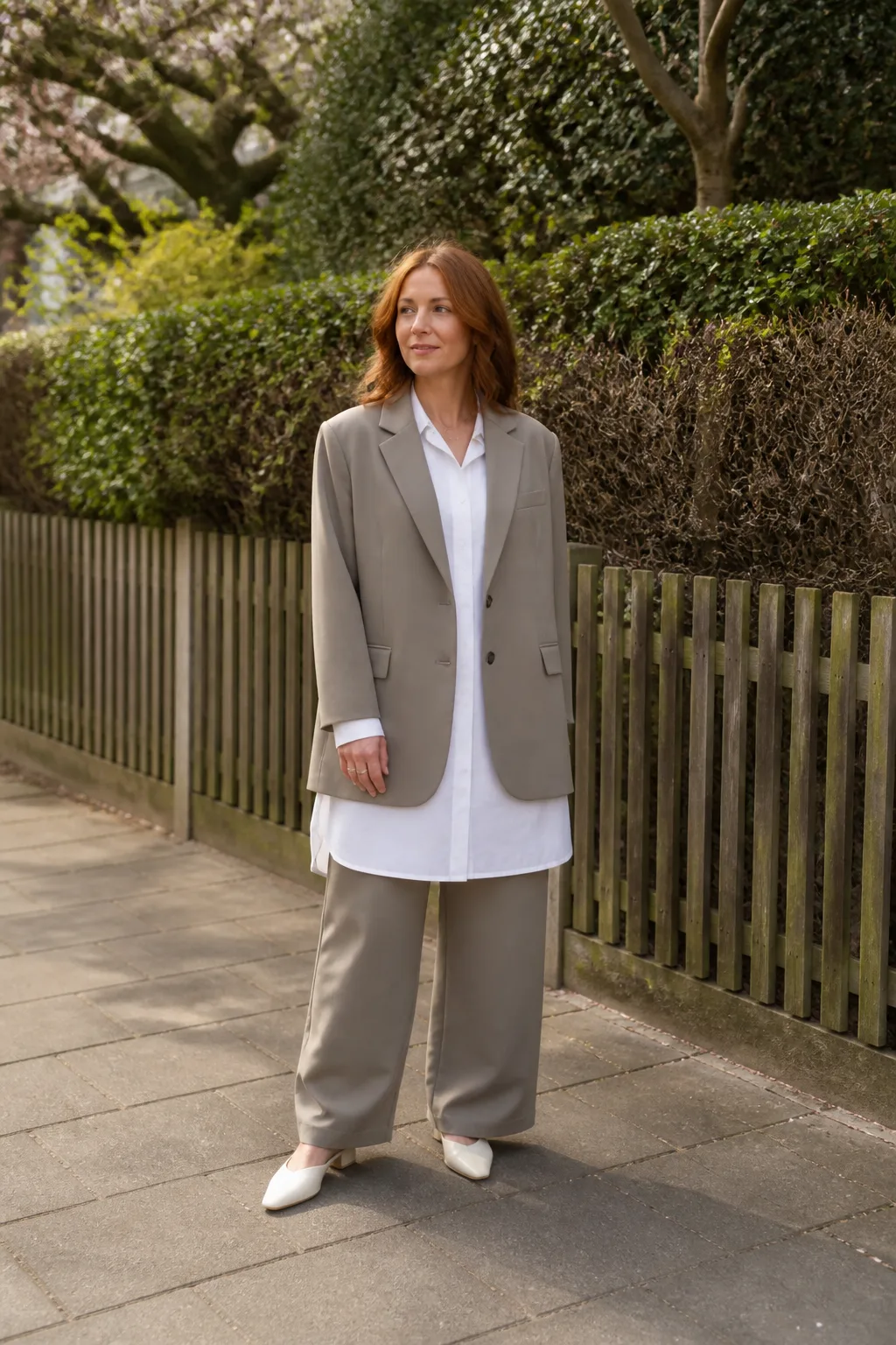 Baggy Suit Outfit Ideas 2026 - 17- Taupe Oversized Suit With a White Linen Shirt Dress Worn as a Layer Beneath