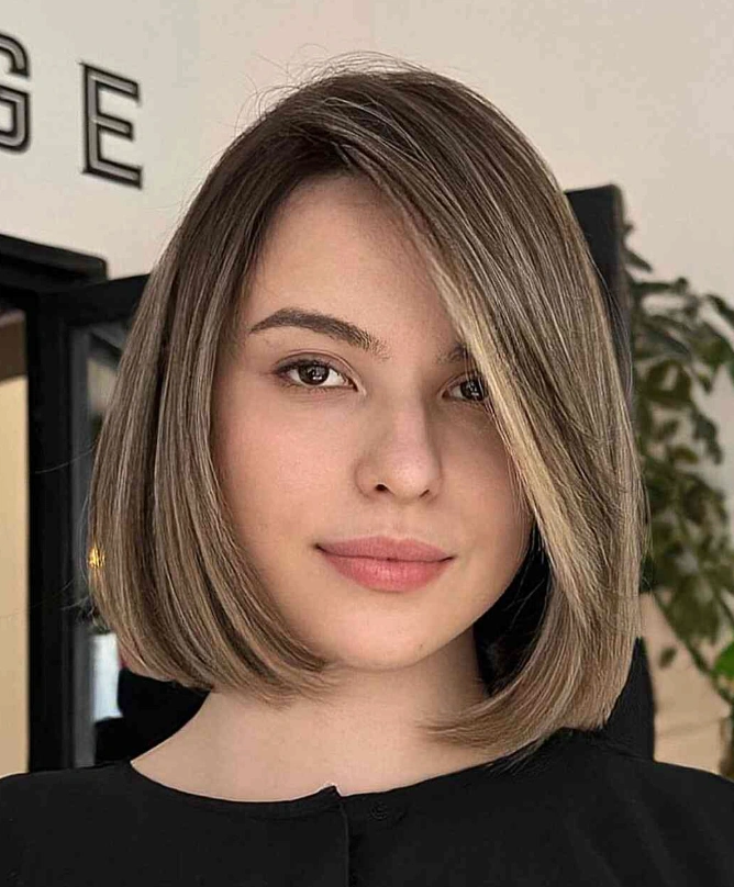 Polished Jaw-Length Bob with Face-Framing Highlights