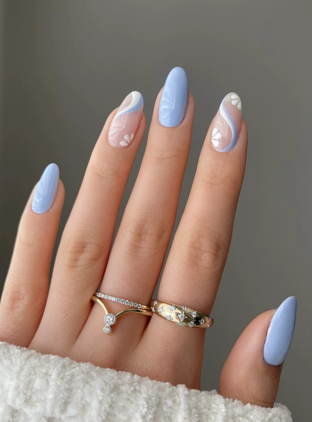 3- Powder Blue Nails With White Petal Swirls