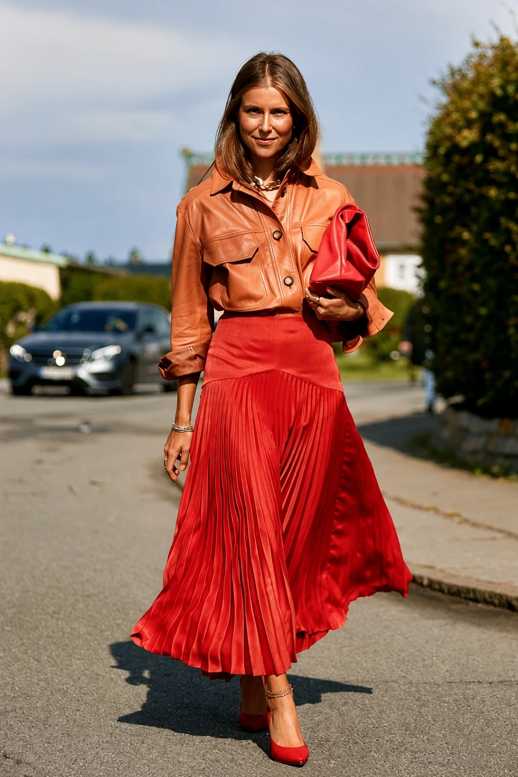 2- Rust Leather Shirt with a Red Pleated Midi