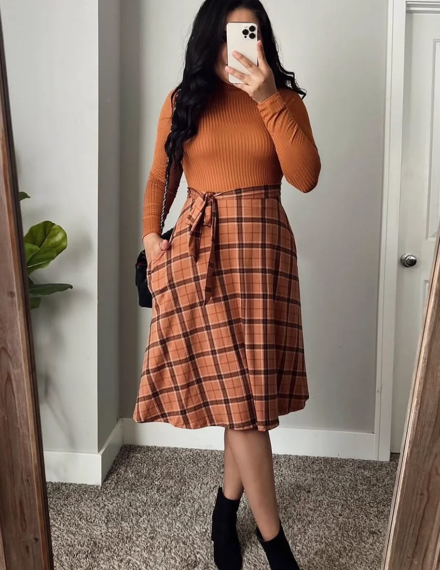 Rust Ribbed Long Sleeve Top + Plaid A-Line Midi Skirt + Black Ankle Boots