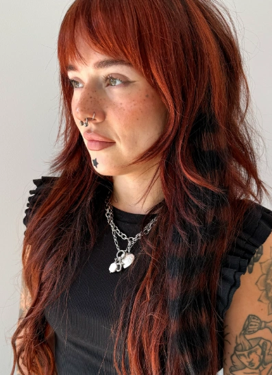 Shaggy Long Bob with Bangs and Red Hair Color