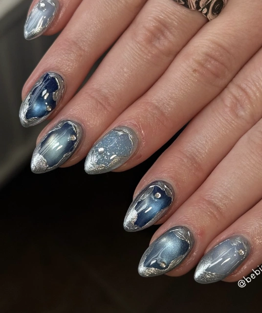 Silver Trimmed Geode Almond Nails