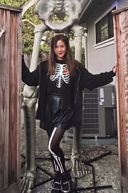 Skeleton Graphic Sweatshirt + Black Leather Skirt + Skeleton Print Tights + Chunky Platform Boots