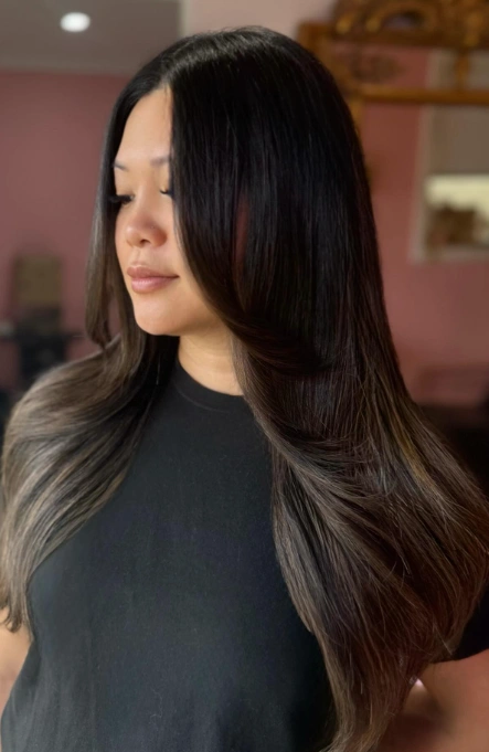 Sleek Dark Brown Hair with Face-Framing Layers and Subtle Ash Blonde Ombre