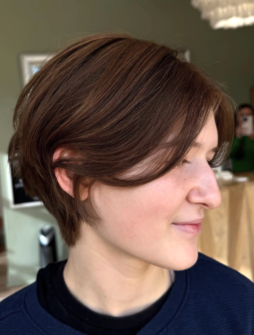 Soft Brown Layered Long Pixie with Angled Bangs