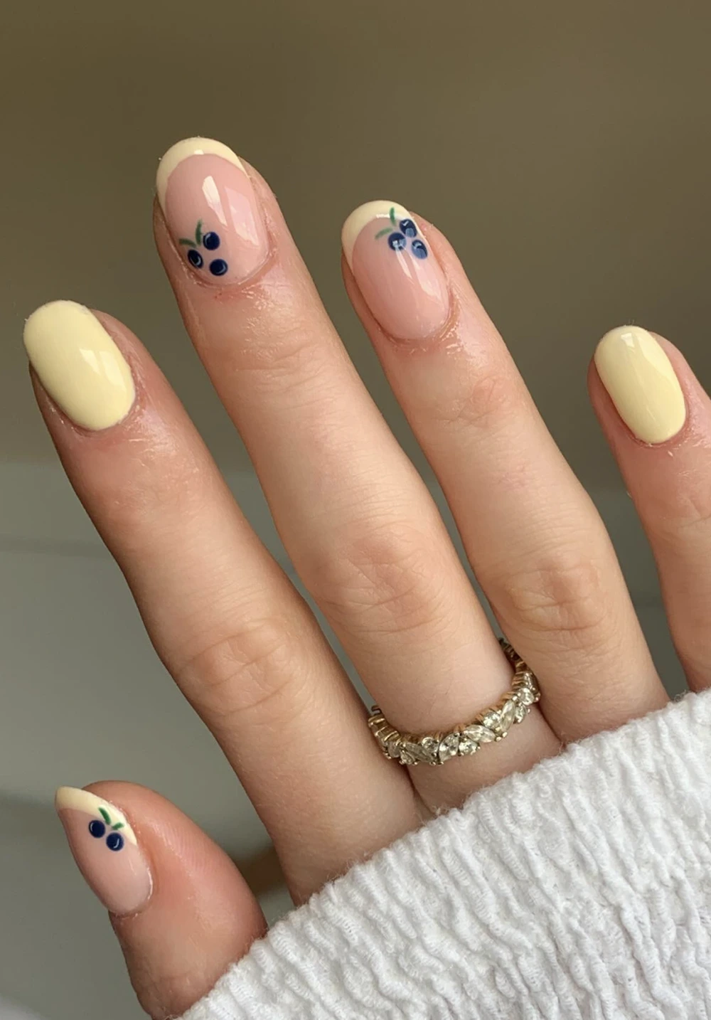 8- Soft Yellow French Tips With Tiny Berries
