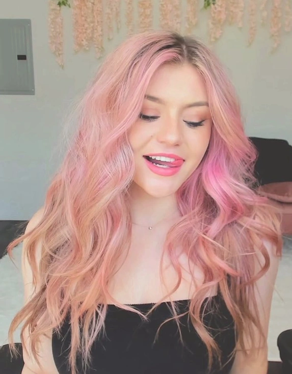 Strawberry Blonde Waves with Delicate Pink Highlights