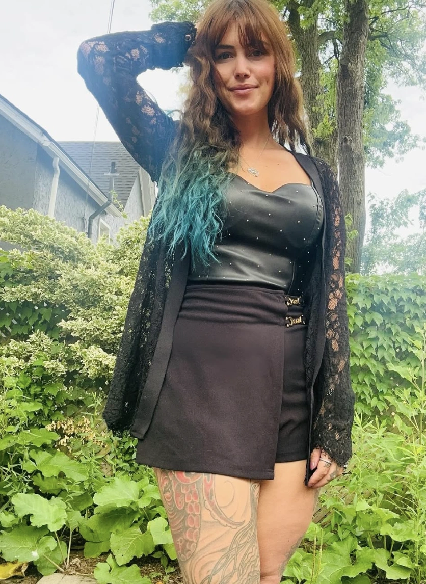 Studded Corset Top + Black Skort + Lace Cardigan