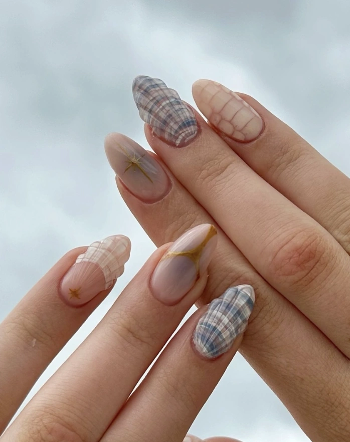 Transparent Plaid & Geometric Almond Nails with Star Accents