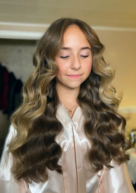 Voluminous, Face-Framing Curls with Subtle Balayage Highlights