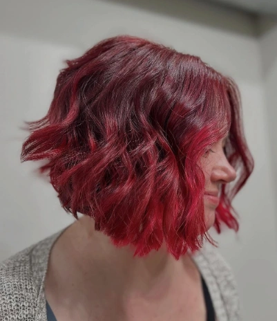 Wavy Angled Bob with Dimensional Red Copper Hair