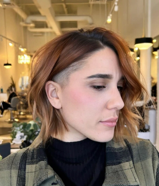 Wavy Auburn Bob with Shaved Side Detail